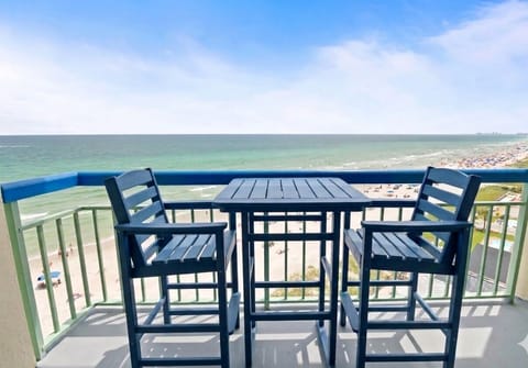 Private beachfront balcony with counter height dining and direct Ocean views.