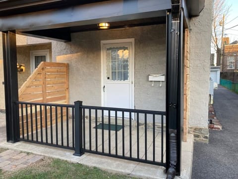Newly finished trim on the front porch adds privacy for our guests.