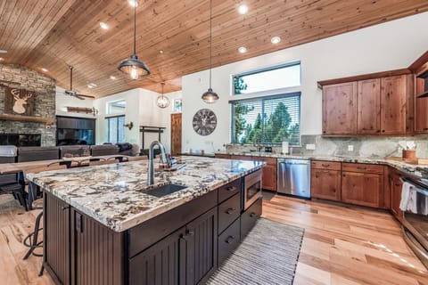 Gorgeous granite island with seating. A fun place to enjoy company while preparing meals.