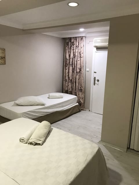 Standard Triple Room | Soundproofing, bed sheets