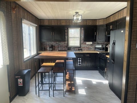 Spacious kitchen with dining table