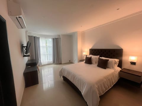 Premium bedding, down comforters, minibar, in-room safe