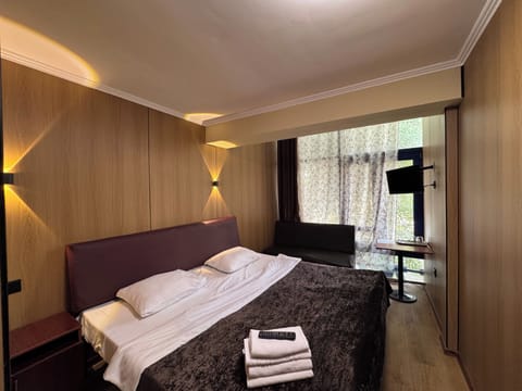 Standard Double or Twin Room | Laptop workspace, blackout drapes, free WiFi, bed sheets