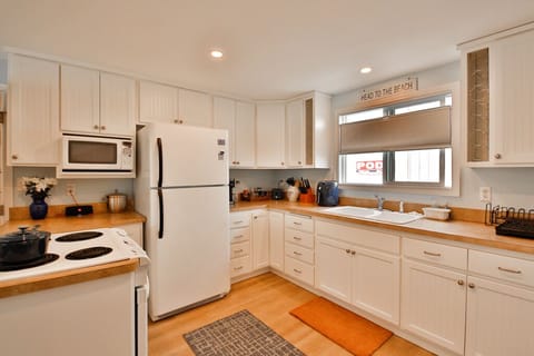 Kitchen with air fryer and keurig, no dishwasher