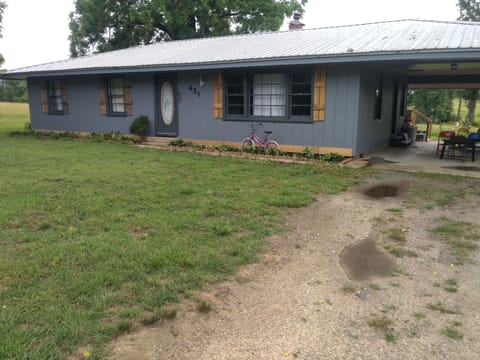 The Rocking J Ranch House has an indoor bathroom with a tub and shower.
