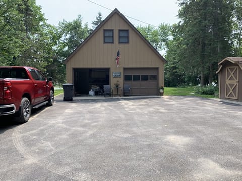 Large driveway with room for toys on trailers. Easy access to outside outlet