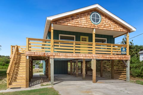 This adorable 3-Bedroom, 2-Bathroom oversized beach box home sits just 600 feet from the beach!