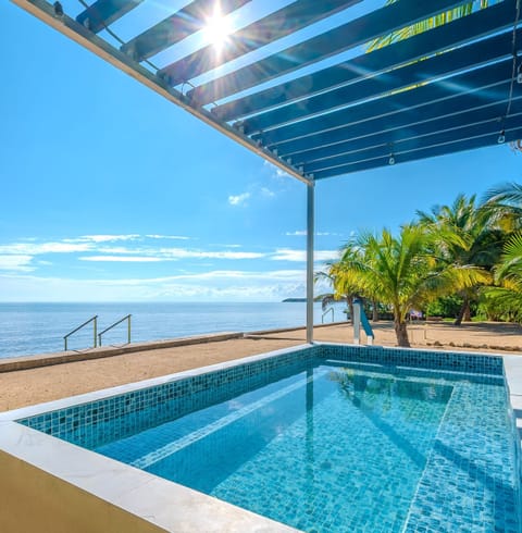 Large Plunge Pool on your private beach with steps into the Caribbean.