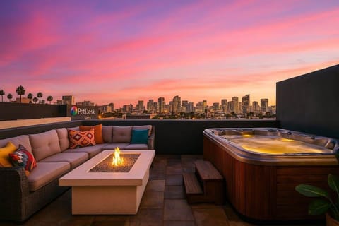 Inviting outdoor space where people can gather, enjoy the warmth and light of the fire, roast marshmallows, have conversations, or simply relax and unwind in the presence of a crackling fire.  Centrally Located with Beautiful Views of Downtown 