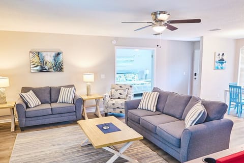 Open living room with Smart TV and comfortable coach