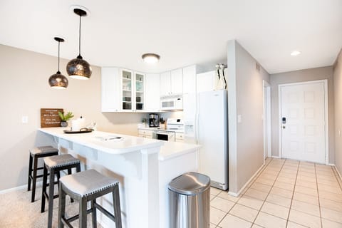 Ample kitchen space with a neat and sleek finish.