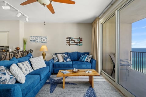 Bright living room with Gulf views, Smart TV, and sleeper sofa — perfect for relaxing after beach days