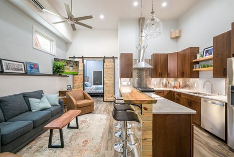 Living and kitchen space with bar seating