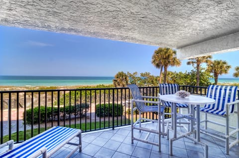 Unobstructed view of the Gulf. High top furniture and lounger