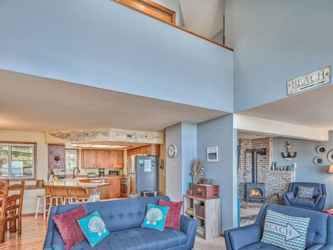 large assortment of board games, large seating area, books, and binoculars 