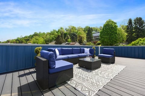 Outdoor patio with comfy seating and scenic views