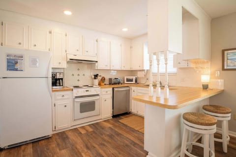 Cheerful Kitchen with everything you need for cooking at home.