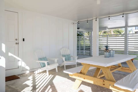 Shaded picnic area under the house.