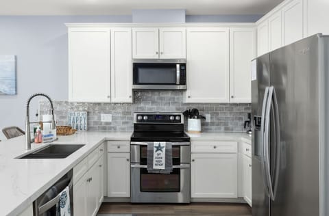 Electric stove top oven, microwave, dishwasher, and refrigerator