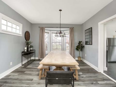 Bright dining area with large table and natural light