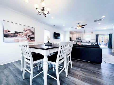 Dining table and living area from front door view