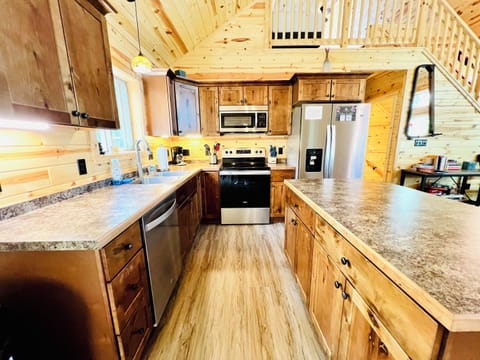 Full kitchen with large center island.
