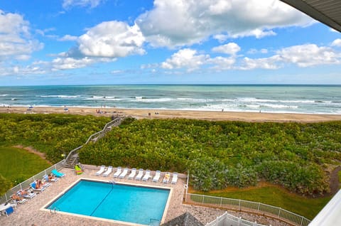 Balcony View overlooking community swimming pool & oceanfront beach