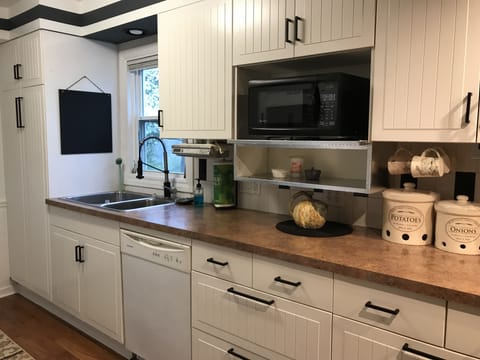 Dishwasher, microwave, slow cooker. toaster oven and everything you need to cook