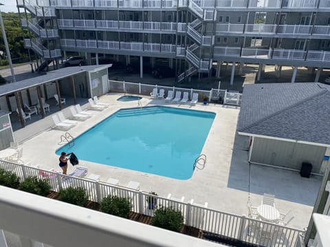 Pool view from condo's front door access area.