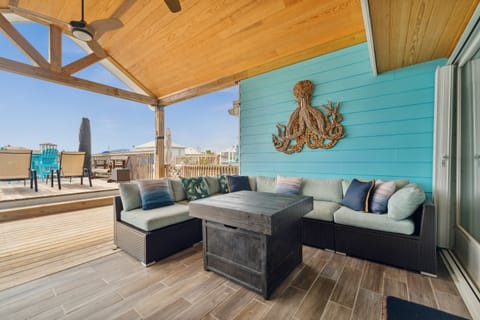 Covered deck with TV and seating for all
