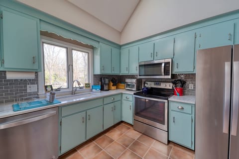 Prepare family meals in the fully equipped modern kitchen.