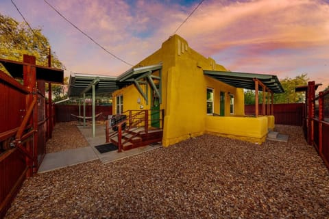 Fully fenced property with covered patios (3 steps up to front entrance)