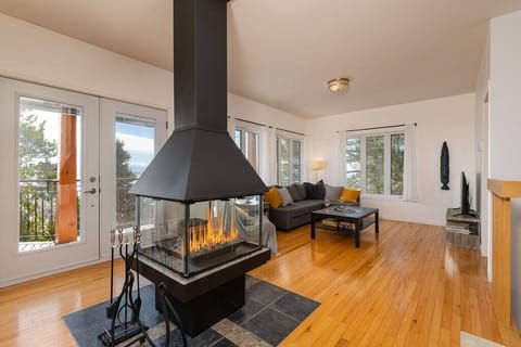 Living room with wood-burning fireplace