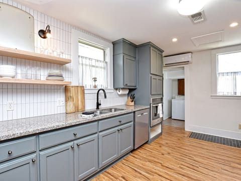 Kitchen and entrance to laundry 