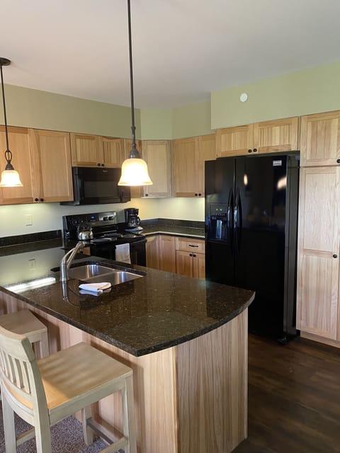 Fully stocked kitchen with granite countertops