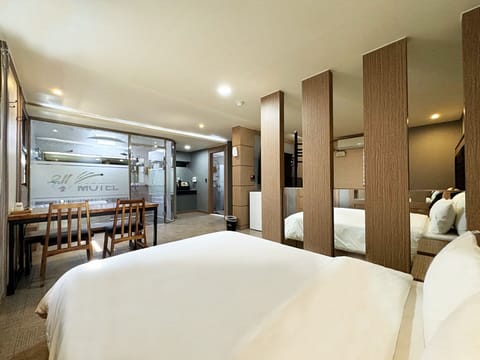 Family Room | Premium bedding, memory foam beds, desk, laptop workspace