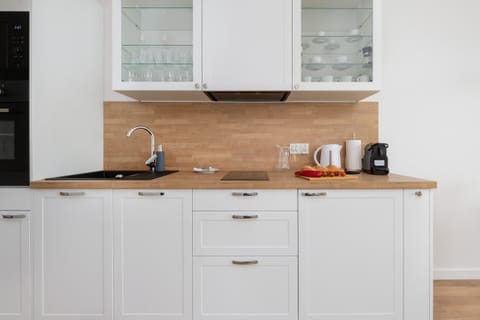 The kitchenette's practical layout maximizes space and functionality.
