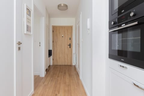 Cook and dine in style with the modern kitchenette and dining area.