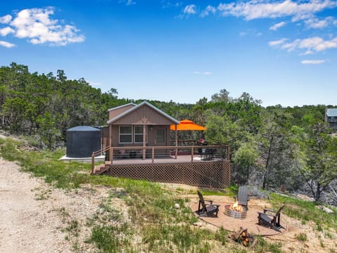 The front of Apline showing the deck and fire pit area.