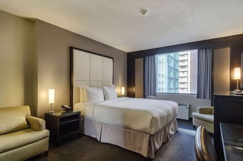 Intimate Queen Room | Premium bedding, memory foam beds, in-room safe, desk