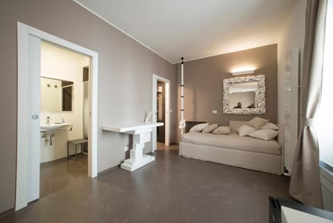 Superior Quadruple Room | Down comforters, minibar, individually decorated, individually furnished