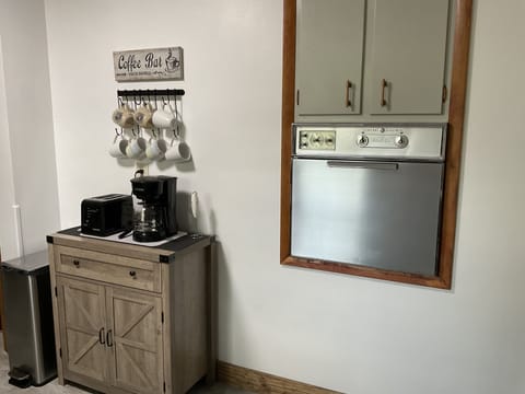 Coffee bar offers different teas and coffees.  Keurig machine, carafe or singles