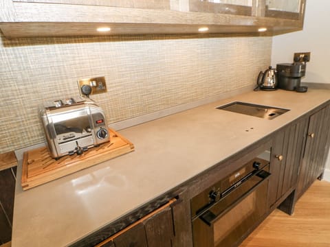 Fridge, electric kettle, toaster, cookware/dishes/utensils