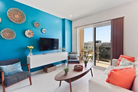 In this condo`s open-concept living area, you can take in the view of Aruba`s beautiful blue skies.