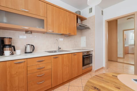  The kitchen's bright space is perfect for preparing meals. 