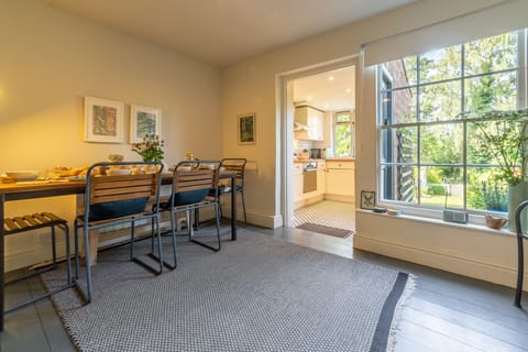 Ground floor: The dining room leads to the kitchen