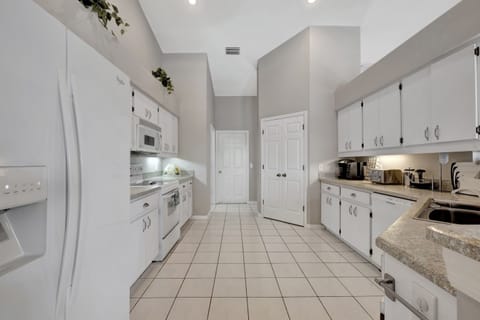 Whether you're preparing a feast for loved ones or simply indulging in a quiet meal for yourself, this kitchen embodies the perfect blend of functionality and beauty.
