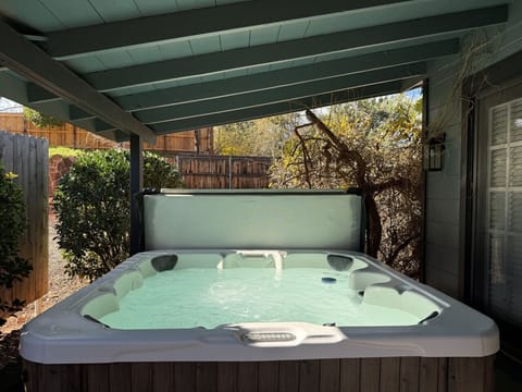 Bubbling hot tub on the covered patio