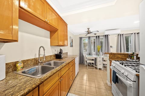 Comfort Apartment | Private kitchen | Full-size fridge, microwave, oven, stovetop