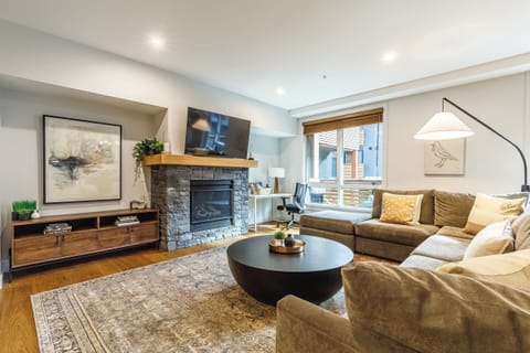 Beautiful Rundle stone gas fireplace is the perfect place to relax by at the end of the day